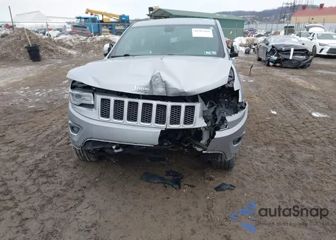 2014 Jeep Grand Cherokee Overland z USA, uszkodzony, nr VIN 1C4RJFCG6EC402398
